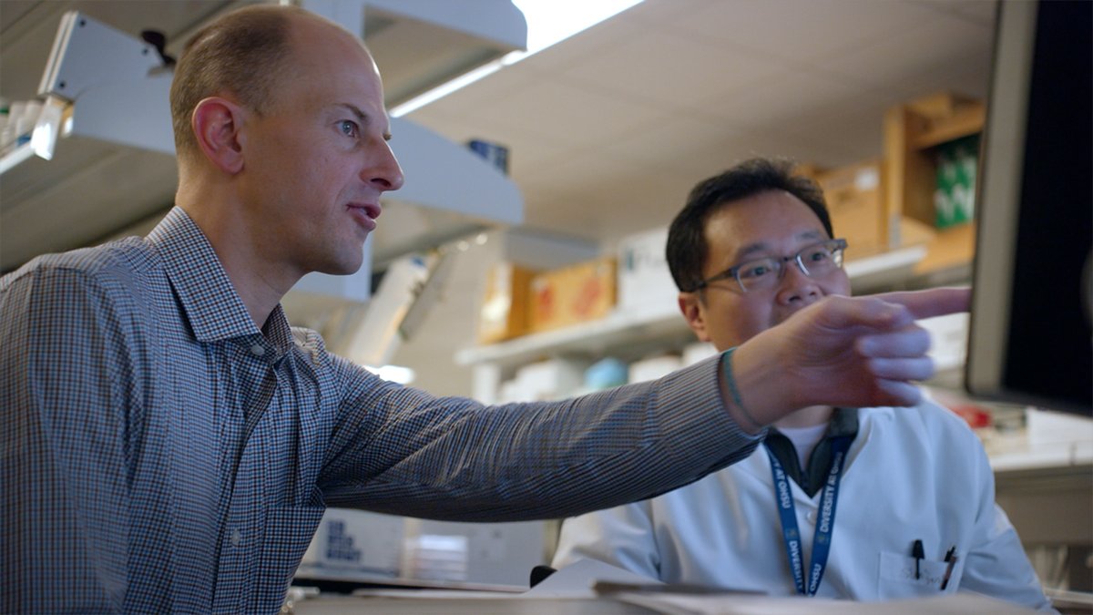 Bryce Olson reviewing genomic data at OHSU