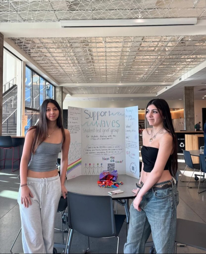 Devona and a friend at their Support Waves booth