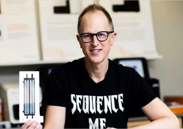Bryce Olson holding a genomic sequencing test